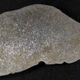 Ilustración para el artículo titulado Guarda una roca durante años pensando que contenía oro y en realidad era un raro meteorito metálico